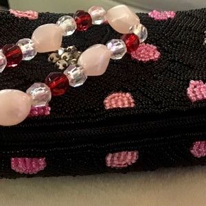 NWOT La Regale Event Wristlet Handbag Beautiful Bead work and crystal handle.
